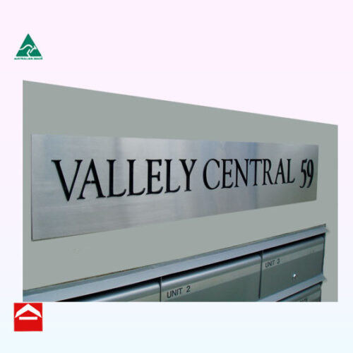 Image of stainless steel with laser cut words Vallely Central 59